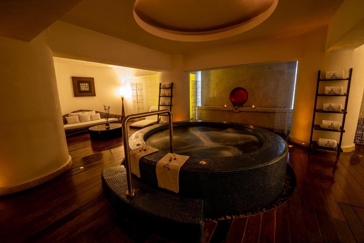 Emporio Acapulco Hotell Exteriör bild A whirlpool bath